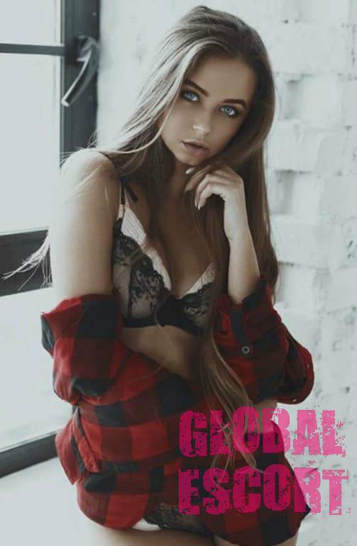 sexy ukrainian escort model posing in black lingerie in a red shirt near the window